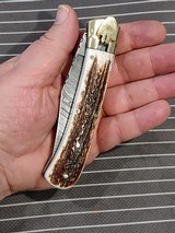 Beautiful Stag and Damascus handmade automatic knife - 7 of 15