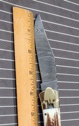 Beautiful Stag and Damascus handmade automatic knife - 11 of 15