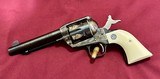 Ruger Vaquero 44 Magnum, Case Hardened Frame, Ivory Grips, Gold Engraved Cylinder, 5.5” barrel, Excellent Condition! Model 00586
