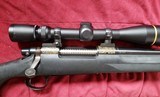 Remington 700 BDL in 7 Remington Ultra Mag RUM with two stocks and Leupold VXIII 4.5x14 - 1 of 12