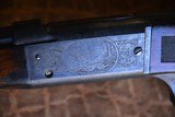 ***SALE PENDING*** Savage 1895 engraved 303 cal. one of 9 that will letter. Comes with factory letter - 1 of 13