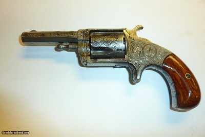 HOPKINS & ALLEN
XL #3 32CAL RIMFIRE FACTORY ENGRAVED REVOLVER.