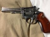 Smith and Wesson model 63 NO DASH with 4" barrel and custom shop grips
- 1 of 4