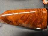 Winchester 9422M XTR in 22 magnum.Bluing is in excellent condition, stock and forearm have minor handling marks as shown in the pictures. - 3 of 9