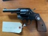 Colt Official Police Revolver with original grips in high condition. - 1 of 5