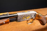 Browning pump action rifle 