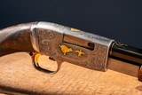 Browning pump action rifle in 22 long engraved by Master Engraver, Angelo Bee - 5 of 15