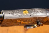 Browning pump action rifle in 22 long engraved by Master Engraver, Angelo Bee - 3 of 15