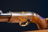 Browning pump action rifle in 22 long engraved by Master Engraver, Angelo Bee - 8 of 15