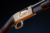 Browning pump action rifle in 22 long engraved by Master Engraver, Angelo Bee - 9 of 15