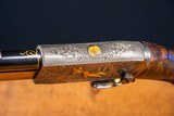 Browning pump action rifle in 22 long engraved by Master Engraver, Angelo Bee - 12 of 15