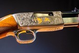 Browning pump-action rifle (Trombone) in 22 Long engraved by Master Engraver, Angelo Bee - 10 of 15