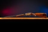 Browning pump-action rifle (Trombone) in 22 Long engraved by Master Engraver, Angelo Bee - 15 of 15