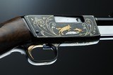 Browning pump action rifle (Trombone) in 22 Long engraved by Master Engraver, Angelo Bee - 5 of 15