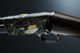 Browning pump action rifle (Trombone) in 22 Long engraved by Master Engraver, Angelo Bee - 8 of 15