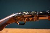 Browning pump action rifle (Trombone) in 22 Long engraved by Master Engraver, Angelo Bee - 7 of 15