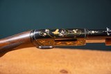 Browning pump action rifle (Trombone) in 22 Long engraved by Master Engraver, Angelo Bee - 13 of 15