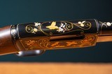 Browning pump action rifle (Trombone) in 22 Long engraved by Master Engraver, Angelo Bee - 11 of 15