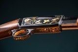 Browning pump action rifle (Trombone) in 22 Long engraved by Master Engraver, Angelo Bee - 9 of 15