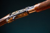 Browning pump action rifle (Trombone) in 22 Long engraved by Master Engraver, Angelo Bee - 5 of 15