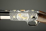 Browning pump action rifle (Trombone) in 22 Long engraved by Master Engraver, Angelo Bee