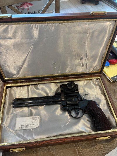 Beautiful 1986 bright polished blue 8” Python, barely fired with SightMark reticle…. A Hunting Machine