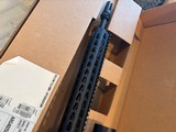 Beautiful unfired NIB custom Bushmaster with Bushnell tactical scope on Vortex Mt. Keymode fore end tactical flash-hider - Image 4 of 15