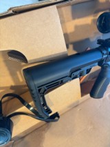 Beautiful unfired NIB custom Bushmaster with Bushnell tactical scope on Vortex Mt. Keymode fore end tactical flash-hider - Image 13 of 15