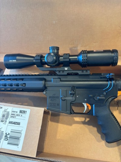 Beautiful unfired NIB custom Bushmaster with Bushnell tactical scope on Vortex Mt. Keymode fore end tactical flash-hider - Image 2 of 15