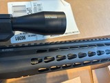 Beautiful unfired NIB custom Bushmaster with Bushnell tactical scope on Vortex Mt. Keymode fore end tactical flash-hider - Image 8 of 15