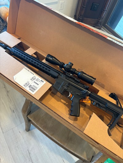Beautiful unfired NIB custom Bushmaster with Bushnell tactical scope on Vortex Mt. Keymode fore end tactical flash-hider - Image 1 of 15