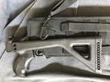 MOSSBERG 500A 12ga.PUMP SHOTGUN w/ FOLDING STOCK ,HEATSHIELD ,CARRY CASE.TACTIAL SHOTGUN - 4 of 12