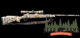 Remington 700 ADL 7mm Rem Mag Camo w/Redfield Illuminator 3x9 Wide view scope - 1 of 15