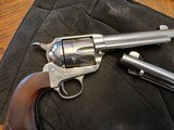 A great pair of stainless Great Western II Revolvers in .357 MAG with lowered hammers. Great for SASS - 3 of 5