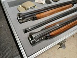 Great looking LIKE NEW! SKB 785 series O/U with 3 barrels .410, 28 gauge and 20 gauge with factory case and extras. - 4 of 13