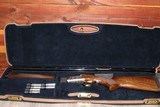 Caesar Guerini 20ga.
Summit Sporting 32