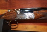 Caesar Guerini 20ga.
Summit Sporting 32