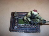 bergmann
cold
painted
bronze
arab
on
rug
w / rifle - 3 of 5
