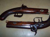 pair
of
british
coat
pistols
.52
caliber - 1 of 8