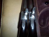 cased pair of percussion
pistols
.47
caliber - 7 of 8