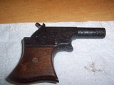 remington vest
pocket
pistol
.41 rf - 2 of 12