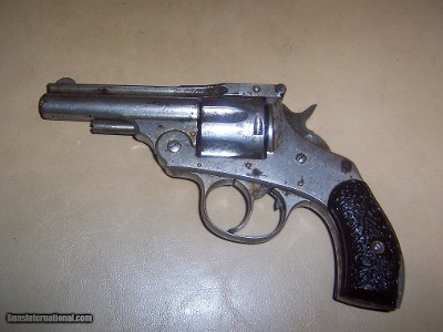 harrington &
richardson
top
break
hand
ejector
32
caliber