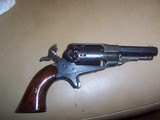 remington
new model
pocket
revolver
.31 caliber - 3 of 6