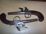 pair
of
cased flintlock pocket
pistols
.42 caliber - 9 of 12