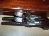 pair
of
cased flintlock pocket
pistols
.42 caliber - 10 of 12