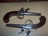 pair
of
cased flintlock pocket
pistols
.42 caliber - 8 of 12