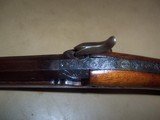 single
shot animal head carved
shotgun
.60 bore - 15 of 20