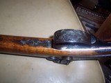 single
shot animal head carved
shotgun
.60 bore - 6 of 20