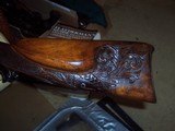 single
shot animal head carved
shotgun
.60 bore - 2 of 20