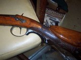 single
shot animal head carved
shotgun
.60 bore - 8 of 20